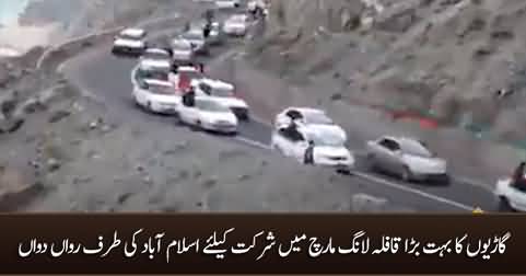 A large convoy of vehicles heading towards Islamabad to participate in the long march