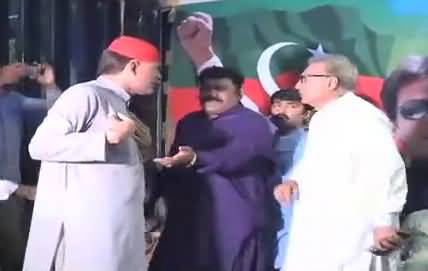 A PTI Worker Protests During Arif Alvi’s Press Conference and Threatens To Commit Suicide