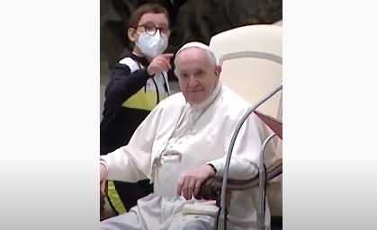 A Young Boy Tries to Take Pope Francis’ Papal Cap in Vatican