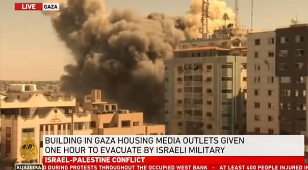 Al-Jazeera Tv Doing Live Coverage of Israel Military Destroying Media Building in Gaza