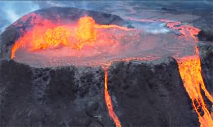 Amazing view: lava erupting from active boiling volcano