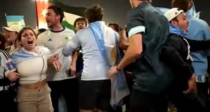Argentinians celebrate their victory as Messi lifts the world cup for them