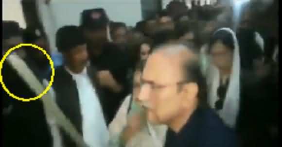 Asif Ali Zardari Hits Police Man With His Stick Before Presenting In Court