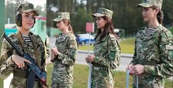 Belarus parades gun-wielding beauty queens in a bid to 'inspire' girls to join the military