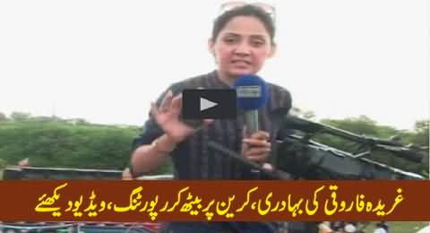 Female Anchor Gharida Farooqi Shows Her Stunt in Public by Sitting on Crane