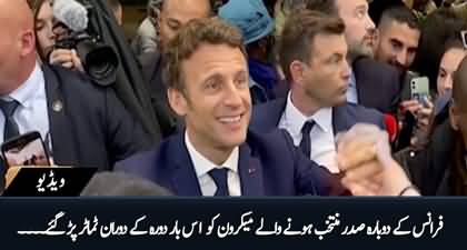 France's President Macron pelted by tomato during a visit to market