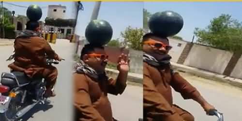 Funny Ride on Bike, Man Introduces Watermelon As Helmet