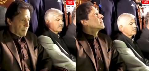 Imran Khan attentively listening the recitation of the Quran on stage