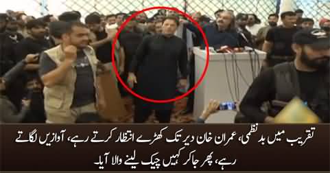 Imran Khan kept waiting on stage until the guy appears to receive cheque