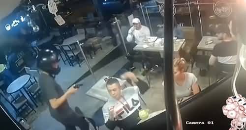 Interesting Video - Man Busy in Eating Chicken While Getting Robbed At A Restaurant
