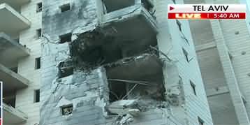 Iranian missiles strike residential buildings in Central Israel