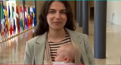 Iranian origin and Swedish female minister attends meeting with 3 months child