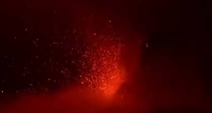 Italy's Mount Etna erupts in red hot explosion at night