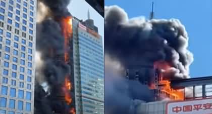 Massive fire tears through high-rise building in China