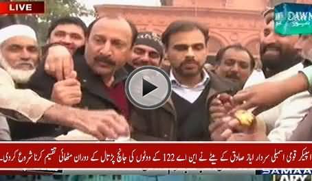 NA Speaker Ayaz Sadiq's Son Distributes Sweets During NA-122 Votes Verification Process