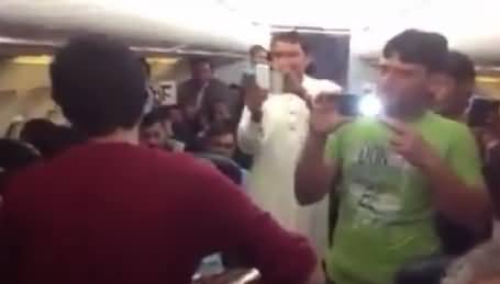 Pakistanis Doing Music Concert Within Shaheen Airline Dubai to Lahore Flight