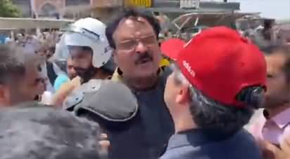Police's attempt to arrest Hammad Azhar, PTI workers protect Hammad Azhar