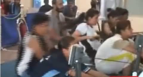 Punjab University Girls Taking Part in Fitness Contests Using New Exercise Machines