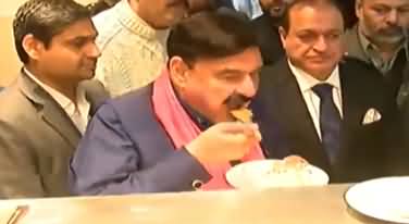 Sheikh Rasheed Surrounded By Media Cameras, Eating Laddu Pethi
