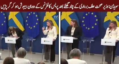 Shocking moment when Swedish health minister collapses mid press talk