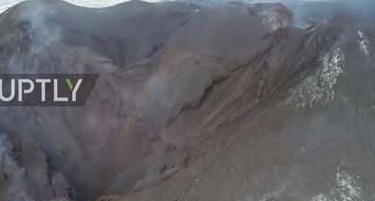 Spectacular aerial images show La Palma volcano falling quiet