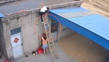 Take Care of Your Toddlers - Chinese Mother Catches 2 Year Son Just Before Falling From Ladder