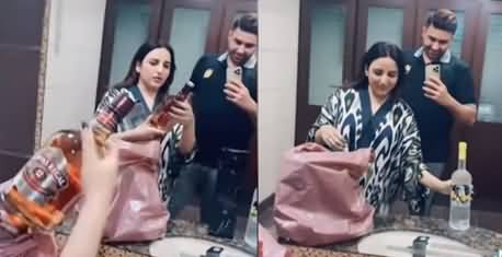 Tiktoker Hareem Shah with a bag full of wine bottles, viral video