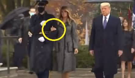 Video - Melania Trump Holds Tight Serviceman’s Arm Rather Donald Trump's As Divorce Suspicions Swirl