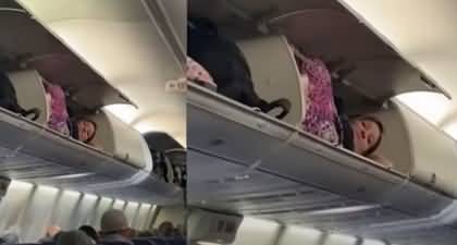 Viral Video: US Woman Climbs Into Overhead Bin Of Plane For Nap