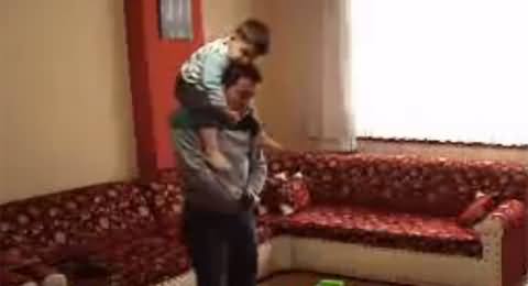 Watch A Cute Child Riding His Father While Offering Prayer