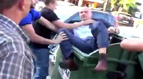 Watch How Ukrainian People Throwing Their Corrupt Politician into Dust Bin