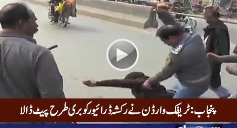 Watch What Punjab Traffic Warden Did With A Poor Rickshaw Driver