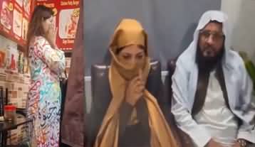 What happened with woman at Ichra Bazar Lahore wearing Arabic calligraphic dress
