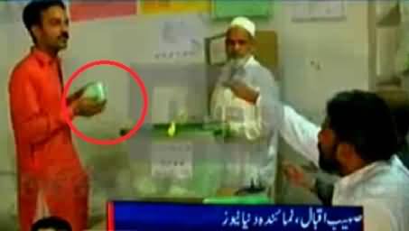 What This Man is Doing Inside A Poling Station in NA-149 By-Election
