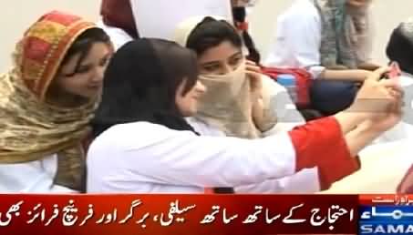Young Female Doctors Enjoying As If They Are on Picnic While Protesting Against Government